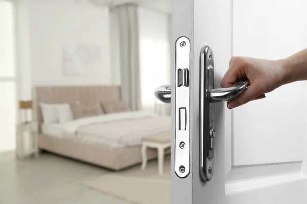 Woman Opening Wooden Door Hotel Room Closeup — Stock Photo, Image