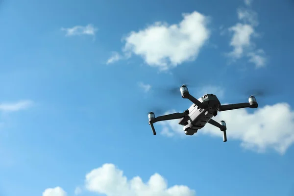 stock image Modern drone with camera flying in sky on sunny day