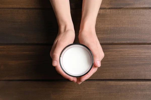 Woman Holding Glass Milk Wooden Table Top View — Stock Photo, Image