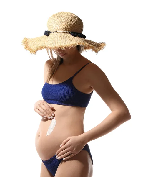 Mulher Grávida Aplicando Creme Proteção Solar Sua Barriga Contra Fundo — Fotografia de Stock