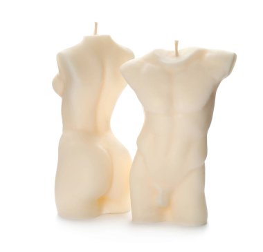 Güzel erkek ve kadın vücudu beyaz arka planda mumlar şekillendirdi.