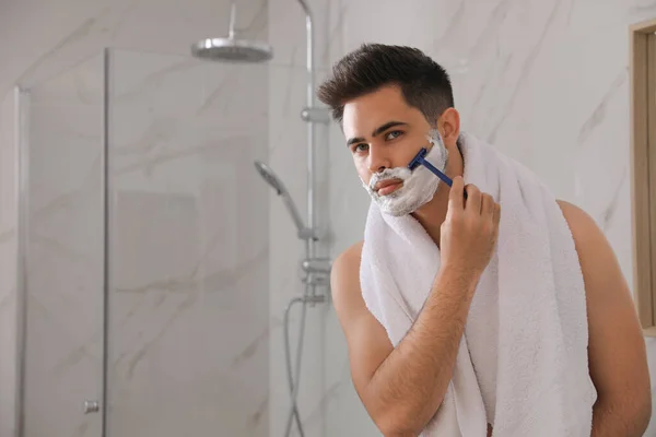Handsome Young Man Shaving Razor Bathroom Space Text — Stock Photo, Image