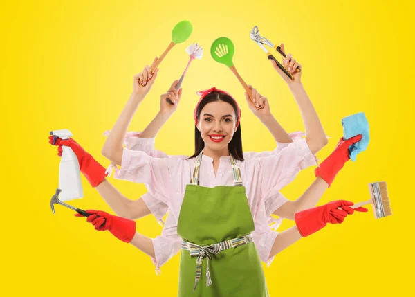 Multitask Housewife Many Hands Holding Different Stuff Yellow Background — Stock Photo, Image