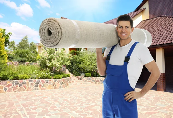 Worker Rolled Carpet Outdoors Sunny Day — Stock Photo, Image