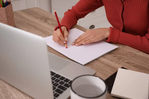 Woman drawing picture at online art lesson indoors, closeup. Distant learning