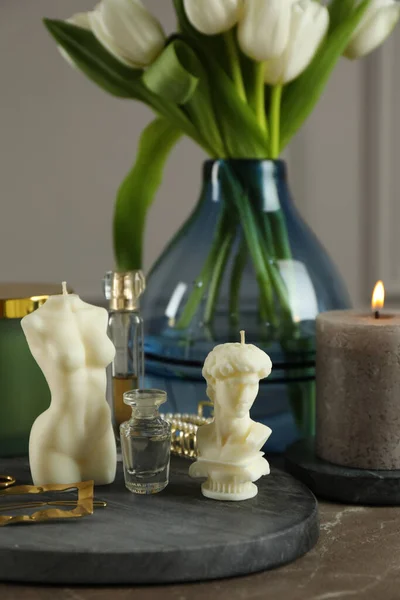 Beautiful Sculptural Candles Flowers Decor Grey Table — Stock Photo, Image