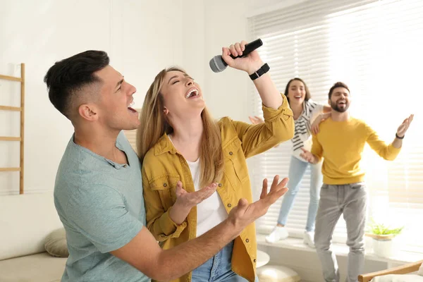 Happy Couple Singing Karaoke Friends Home — Stock Photo, Image