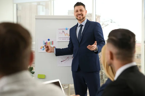 Businesspeople having meeting in office. Management consulting