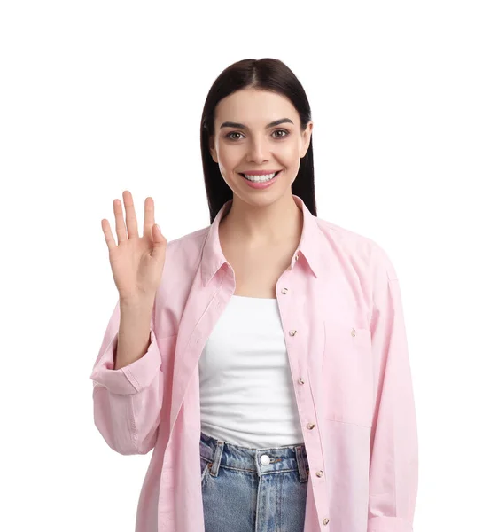 Atractiva Mujer Joven Mostrando Gesto Saludo Sobre Fondo Blanco — Foto de Stock