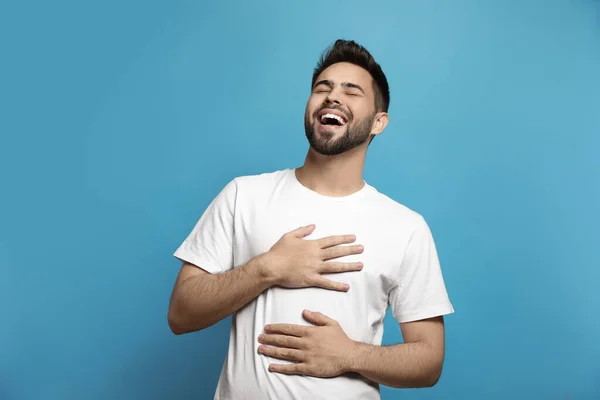 Young Man Laughing Light Blue Background Funny Joke — Stock Photo, Image