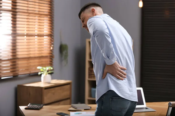 Man Suffering Back Pain Office Symptom Poor Posture — Stock Photo, Image