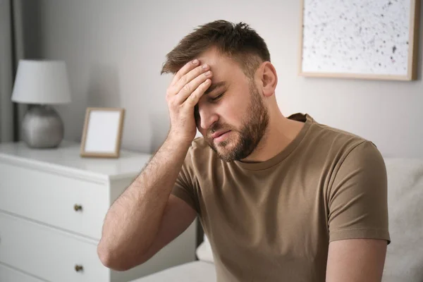 Young Man Suffering Migraine Home — Stock Photo, Image