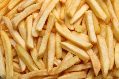 Arka plan olarak lezzetli patates kızartması, üst manzara.