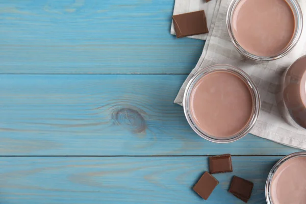 Delicious Chocolate Milk Light Blue Wooden Table Flat Lay Space — 图库照片