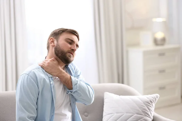 Man Suffering Neck Pain Home Bad Posture Problem — Stock Photo, Image