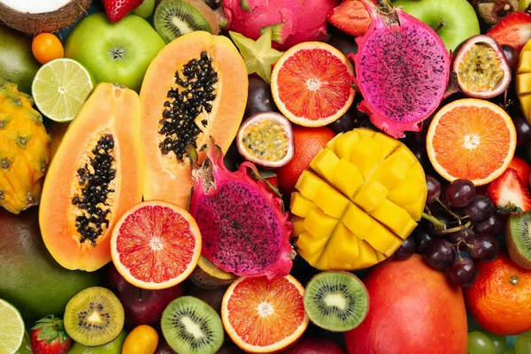 Πολλά Διαφορετικά Νόστιμα Εξωτικά Φρούτα Φόντο Top View — Φωτογραφία Αρχείου