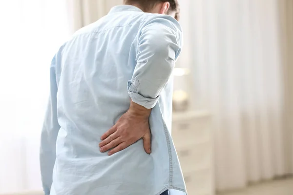 Man Suffering Back Pain Home Closeup Bad Posture Problem — Stock Photo, Image