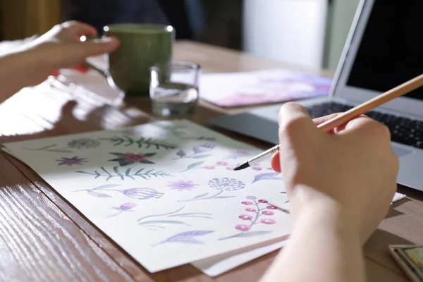 Woman drawing picture at online art lesson indoors, closeup. Distant learning