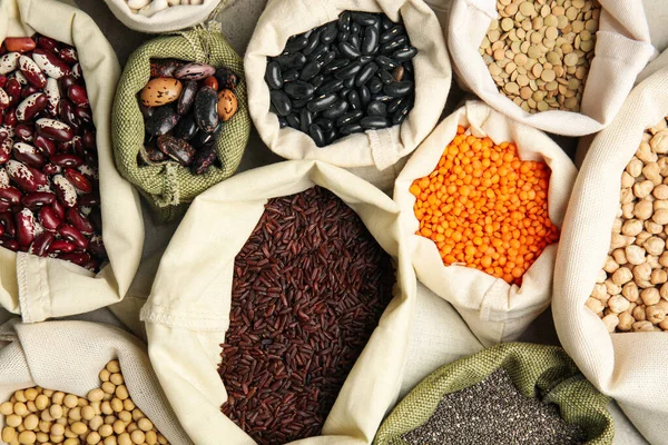 Arka Plan Olarak Farklı Tahıl Tohumlar Üst Görünüm Sebze Diyeti — Stok fotoğraf