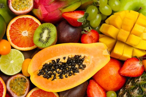 Πολλά Διαφορετικά Νόστιμα Εξωτικά Φρούτα Φόντο Top View — Φωτογραφία Αρχείου