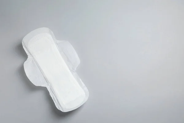 Sanitary Napkin Light Grey Background Top View Space Text — Stock Photo, Image