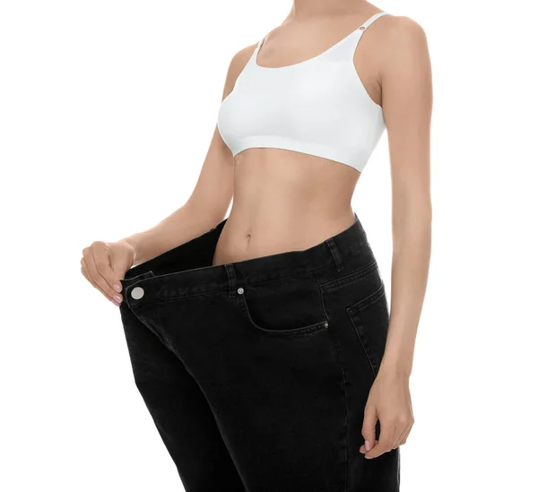 Young Woman Wearing Big Jeans Weight Loss White Background Closeup — Stock Photo, Image