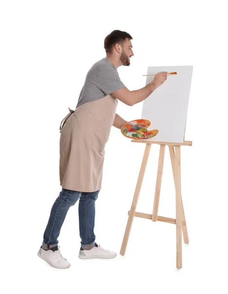 Hombre Pintando Con Pincel Sobre Caballete Sobre Fondo Blanco Joven —  Fotos de Stock