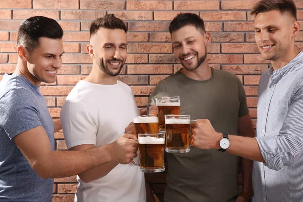 Friends Clinking Glasses Beer Red Brick Wall — Stock Photo, Image