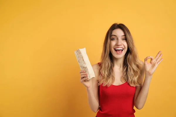 Excited Young Woman Delicious Shawarma Yellow Background Space Text — Stock Photo, Image