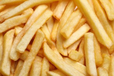 Arka plan olarak lezzetli patates kızartması, üst manzara.
