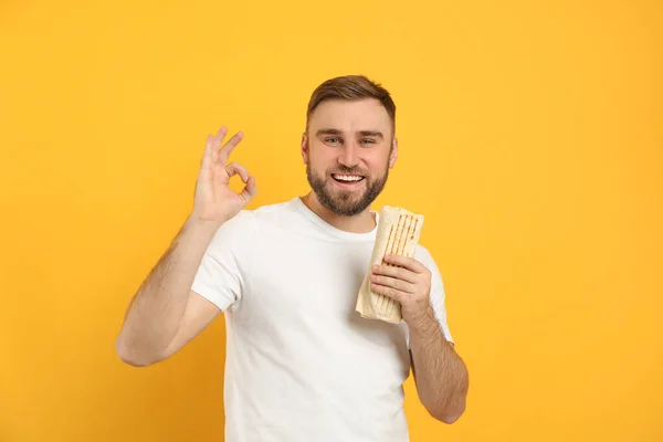 Young Man Delicious Shawarma Yellow Background — Stock Photo, Image