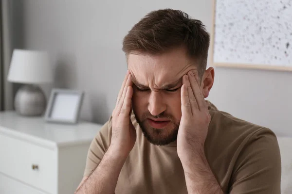 Young Man Suffering Migraine Home — Stock Photo, Image