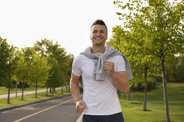 Young Man Fitness Clothes Running Outdoors — Stock Photo, Image