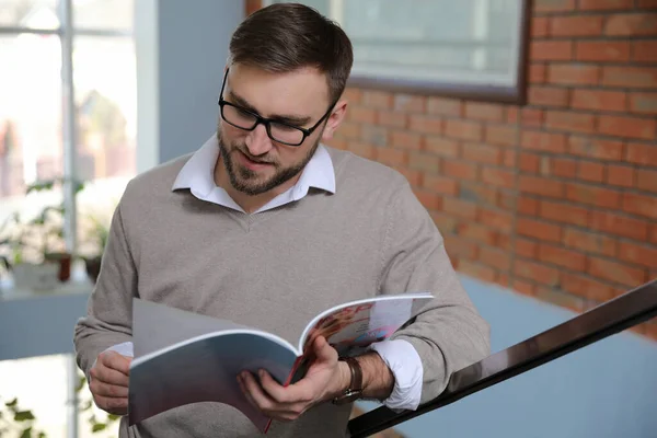 Young Business Man Reading Sports Magazine Home — Stock Photo, Image