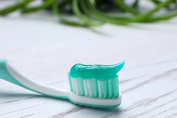 Brush Toothpaste White Wooden Table Closeup — Stock Photo, Image