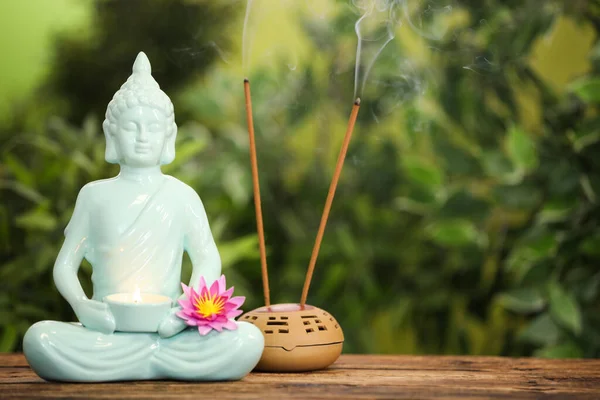 Buddha Statue Burning Candle Lotus Flower Incense Sticks Wooden Table — Stock Photo, Image