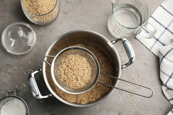 Sieve Rice Pot Grey Table Flat Lay — Stock Photo, Image