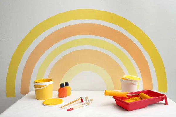 Different Decorator Tools White Table Wall Painted Rainbow Indoors — Stock Photo, Image