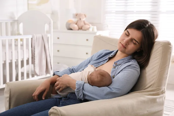 Tired Young Mother Sleeping While Breastfeeding Her Baby Children Room — Stock Photo, Image