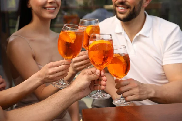 Friends Clinking Glasses Aperol Spritz Cocktails Outdoors Closeup — Stock Photo, Image
