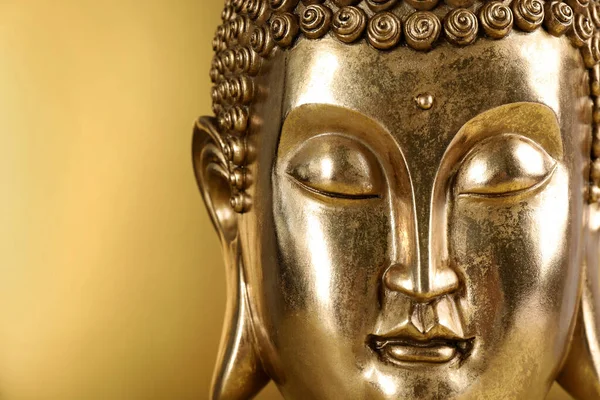 Buddha Statue Golden Background Closeup Space Text Stock Image