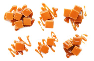 Beyaz arka planda soslu, nefis karamel şekerler.