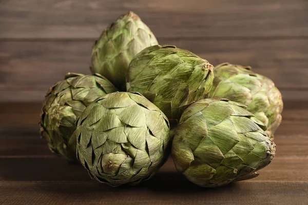 Many Fresh Raw Artichokes Wooden Table — Stock Photo, Image