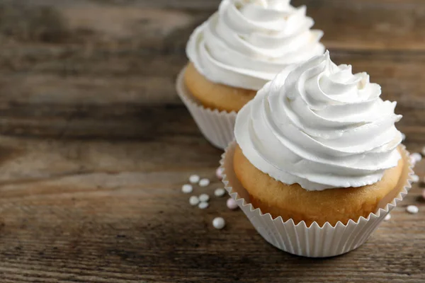 Delicious Cupcakes Cream Wooden Table Closeup Space Text — Stock Photo, Image