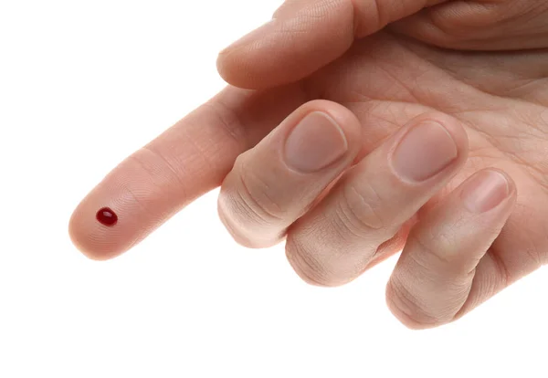 Kvinna Med Stickat Finger Och Blod Droppe Vit Bakgrund Närbild — Stockfoto
