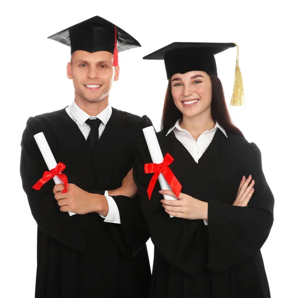 Щасливі Студенти Академічних Сукнях Дипломами Білому Тлі — стокове фото