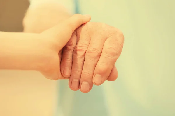 Helping Hands Blurred Background Closeup Elderly Care Concept — Stock Photo, Image