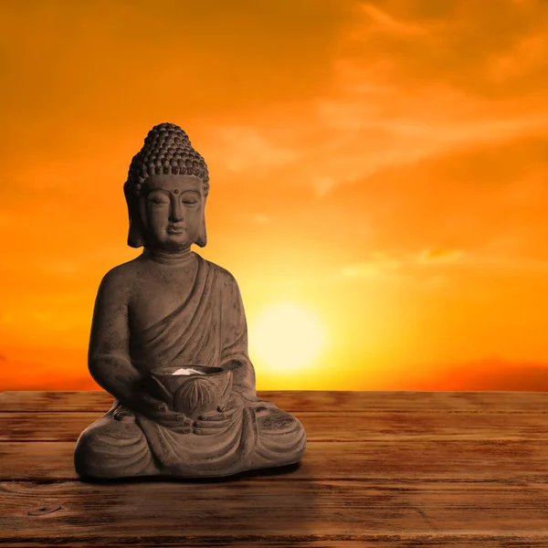 Beautiful Stone Buddha Sculpture Wooden Surface Sunset Space Text — Stock Photo, Image