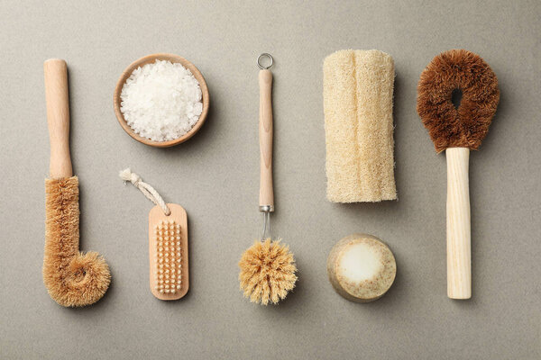 Flat lay composition with eco friendly products on light grey background. Conscious consumption