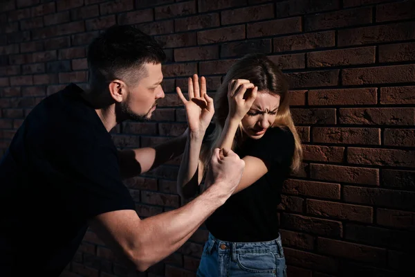 Man Abusing Scared Woman Brick Wall Domestic Violence — Stock Photo, Image